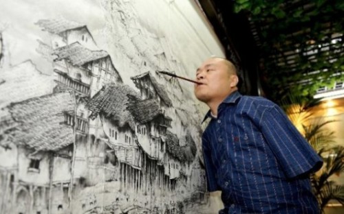 allwhitewolves:  gaksdesigns:  41 year old Huang Guofu, from Chongqing, China, has learned to master the paintbrush with his mouth and right foot, after he lost both his hands in a childhood accident.  I love people like this.