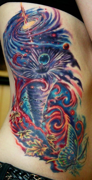arrowsandemberstattoo:  Black Hole Rib Piece 