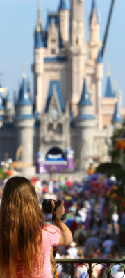 orlandosentinel:  A guest photographs Cinderella Castle at Walt Disney World’s Magic Kingdom on Thursday, September 29, 2011. The resort turns 40 this weekend, and in many respects, the place looks a lot like it did at 30. It hasn’t built a new theme