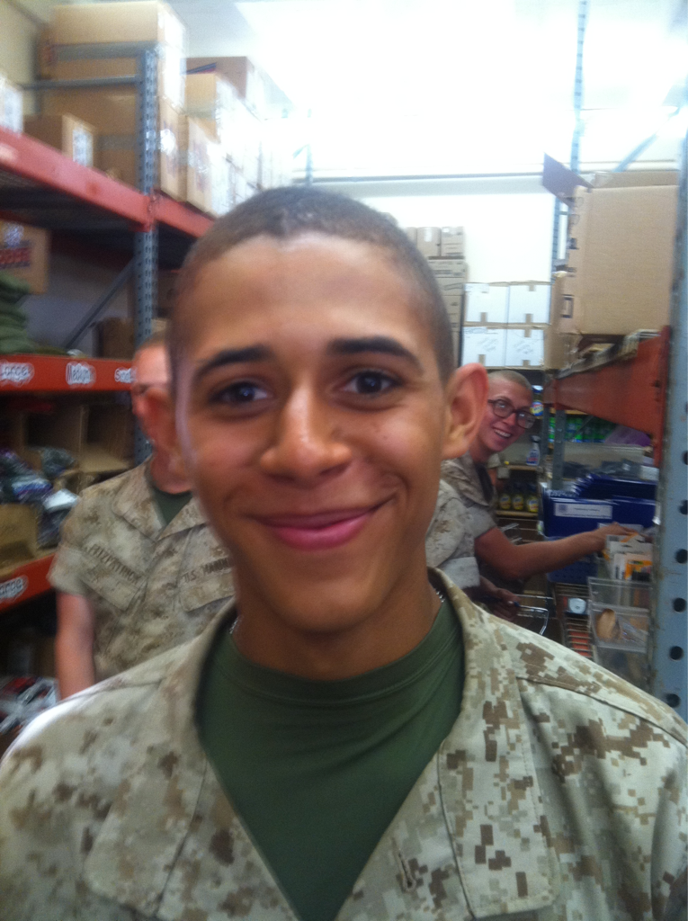 President Obama joins the marines. this kid looked just like obama the photo doesnot