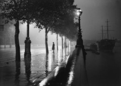 M3Zzaluna:  Rainy Embankment, A Man Standing Alone On A Rain-Drenched Pavement On