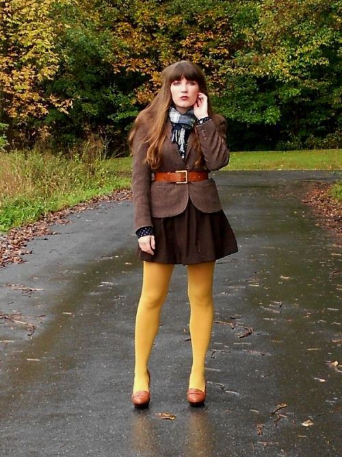 Yellow tights power with brown skirt and jacket
