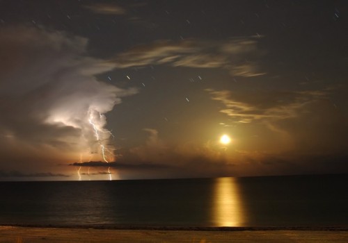 Moon Lightning StarsMoonsets are not often quite as exciting as this one. But amateur astronomer Mar