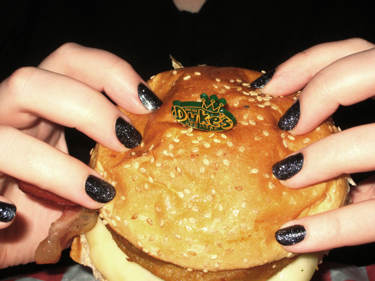 nailburgerlar:
“Look who’s back! It’s Caoine from NYC with a burger with an onion ring, INSIDE! Why have I never had this!?”
“I’m enjoying a Southern Comfort burger from Duke’s in NYC. You can’t really see the patty, but it’s topped with onion rings,...