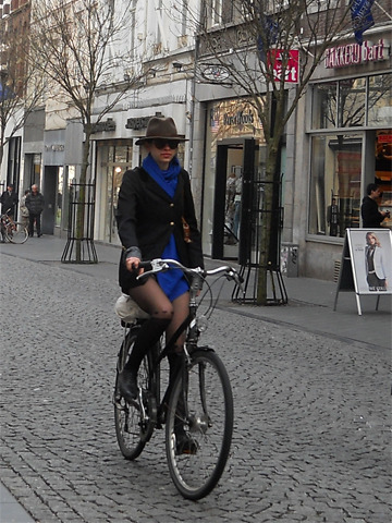 simcute: Lovely cyclist on a chill day of spring in Maastricht.