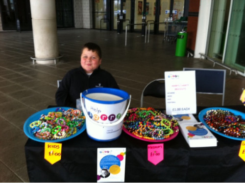 starkidbamf-blog:  This is Harry Moseley. He was an 11 year old boy with an inoperable brain tumor. He raised money for brain cancer research and made bracelets, and did public speaking to raise awareness and funds for his illness. Harry is one of the