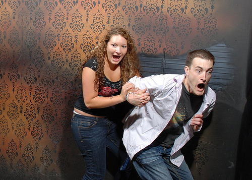 Setting up a camera in a haunted house?  Always a good idea. (by Nightmares Fear Factory)