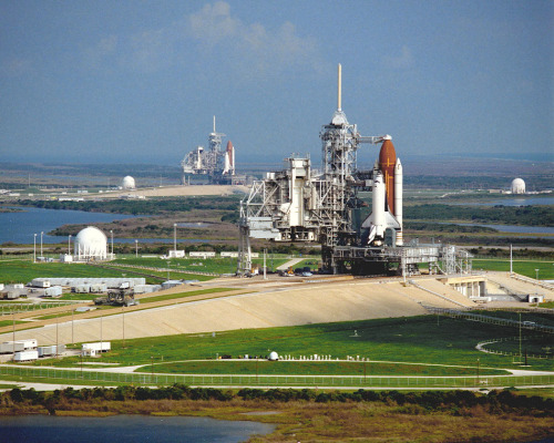 Columbia awaits launch for mission STS-35 on Pad 39-A while Discovery sits on Pad 39-B for mission S