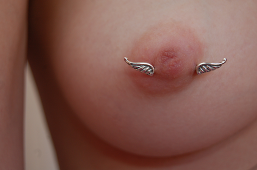 returnofz:  this photo was the reason i got my nipples pierced, literally.  m