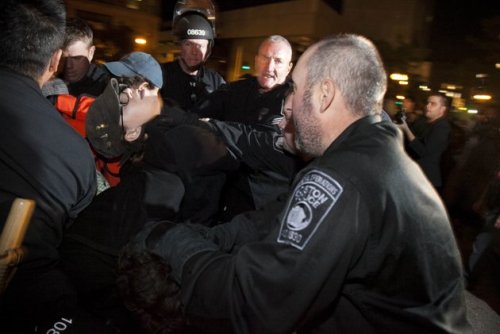 cultureofresistance:socialismartnature:Photo of Boston cop grabbing woman by throat during police at