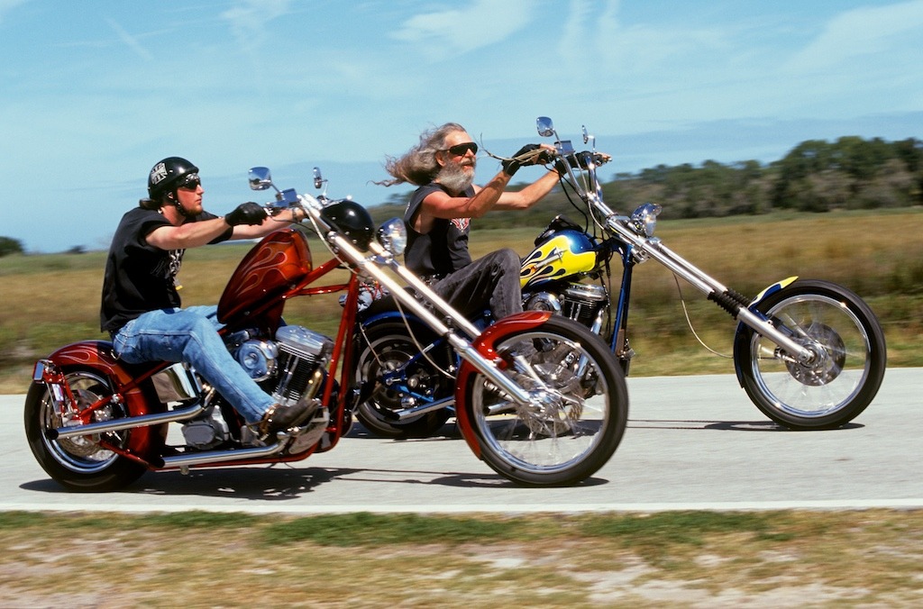 This is one of my favourite Harley photos. My friends Robert ‘Dark Star’ Smith and his son Harley Smith making passes for the camera in the Everglades of Florida after I had interviewed them for my book 'Harley People’ published by Haynes Books.
Dark...