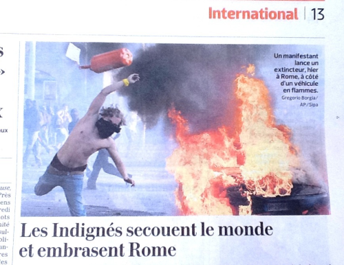 newsweek-paris-france:Kiosque: This photograph of an anarchist in Rome throwing a fire extinguishe