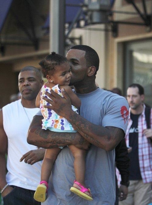 old-school-shit:  checkdarhyme:  waybetterthanyou:  The Game and his beautiful daughter. 