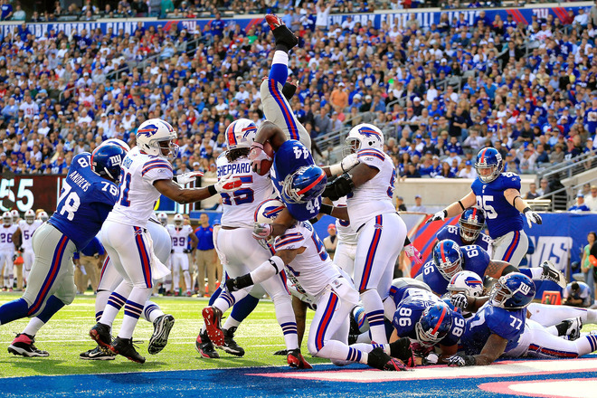 fourthquartertouchdown:  Ahmad Bradshaw leaps into the endzone.  Of course he does.