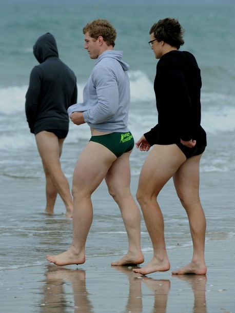 cooperquinn:  everythingrwcrelated:  Australian Wallabies David Pocock  and Luke Burgess  walk into the water at Takapuna Beach  I don’t normally swear but fuck me dead!  FUCK!!!! JESUS. Those asses. Those thighs. My face.