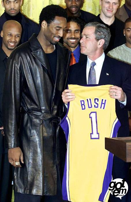 imjustboutthatactionboss:  gotemcoach:  Do you guys remember when the Lakers visited President George Bush, and Kobe wore a gigantic, classy, black, leather jacket? Shout out to Jelani McCoy. @gotem_coach  kobe was at the white house looking like blade