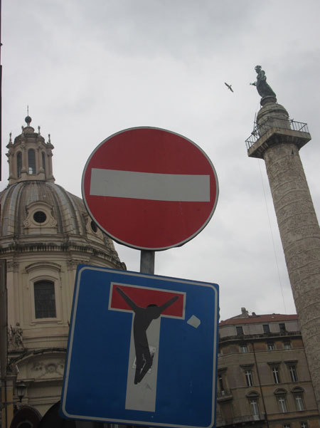 austinkleon:  Florence-born street artist Clet Abraham sticks removable stickers onto street signs across Italy. I love the idea of non-destructive graffiti, and would love a way to do my de-signs in real life without getting arrested… (via murketing)