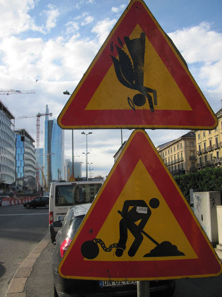 austinkleon:  Florence-born street artist Clet Abraham sticks removable stickers onto street signs across Italy. I love the idea of non-destructive graffiti, and would love a way to do my de-signs in real life without getting arrested… (via murketing)