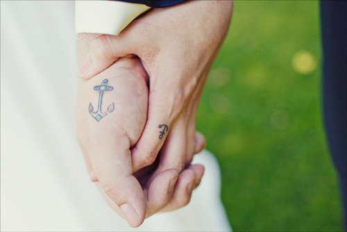 Couple matching heart and key tattoo