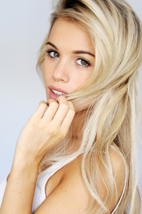 White blonde hair dark eyebrows