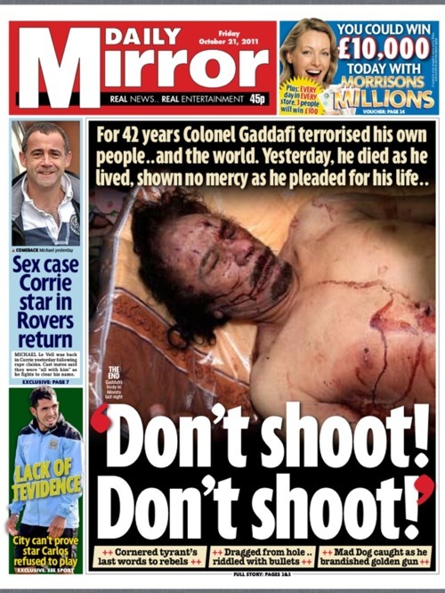 XXX Gaddafi's bloody picture hits the front pages photo