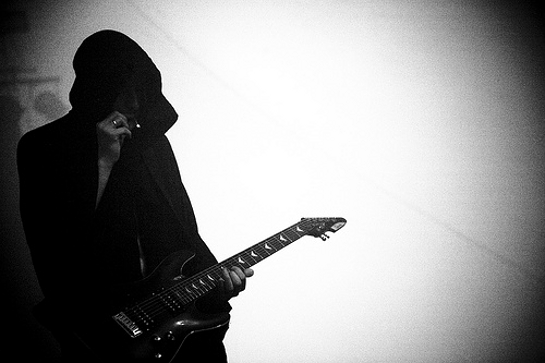 jkflesh:  Broadrick having a cig on stage with Sunn O))), at Dour festival, Belgium,