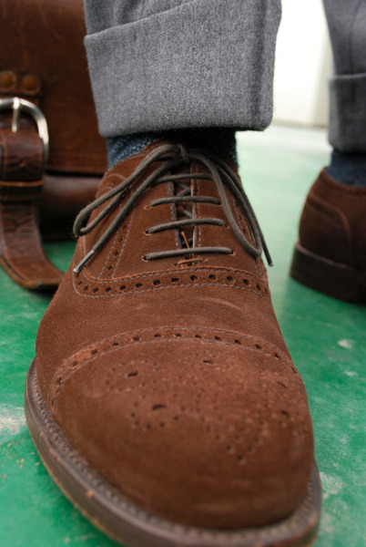 Brown suede cap toes.