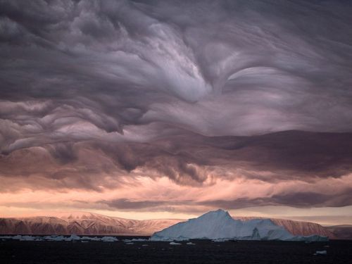 sav3mys0ul:  Stratus Clouds, Greenland Photograph by Bryan and Cherry Alexander, Arctic Photo Eight hundred miles south of the North Pole, stalactite-like stratus clouds—churned by 90-mile-an-hour winds—and the light of a bruised dawn paint an apocalyptic