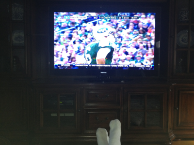 Watching the game on a 55" HDTV at home is so much better than being at school. Swag.