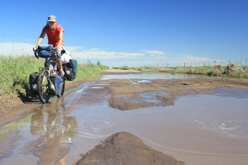 Avoiding the puddles near Las Acequias by monkeypike on Flickr.