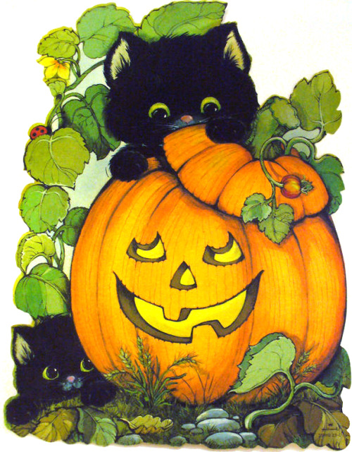 Pretty sure my family had this jack-o’lantern and kitty cut-out.