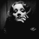 avagardner:  A Femme Fatale is a mysterious and seductive woman. Whose charms ensnare her lovers in bonds of irresistible desire, often leading them into compromising, dangerous, and deadly situations. 