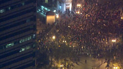 occupywallstreet:  Thousands gathered in front of Oakland’s City Hall this evening in response to last night’s violent police invasion and destruction of Occupy Oakland’s camp. Tonight, police have again used tear gas, flash grenades and rubber