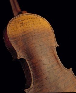 manchannel:  Engraved violin.  