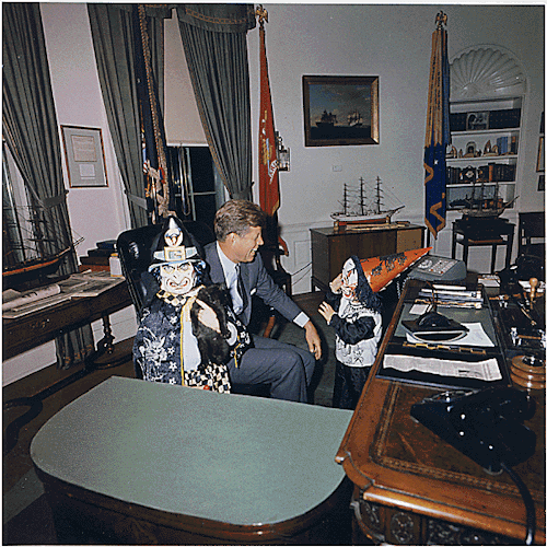 Two generations of Kennedys celebrate Halloween:
“ Photograph of John F. Kennedy as a “Keystone Kop”, ca. 1925
Halloween Visitors to the Oval Office. Caroline Kennedy, President Kennedy, John F. Kennedy, Jr. White House, Oval Office., 10/31/1963
”