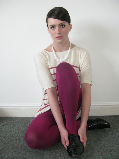 Dark pink tights, pearl necklace