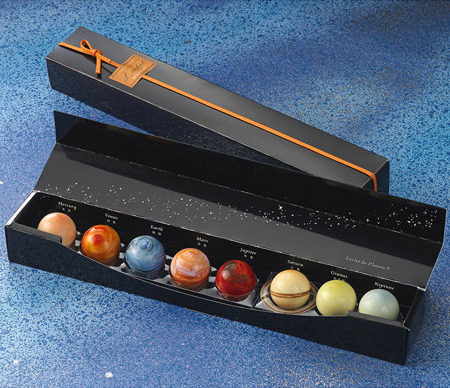 semataryonmars:  kenobi-wan-obi:  iwantalot:blackpawssnowdeep:hxcfairy:   CHOCOLATE.  #the solar system is like a box of chocolates  the things I’d do to the person who’d get me this.. unspeakable.  aw man I thought they’re marbles.. 