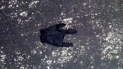 Abandoned Rocker Glove In The Parking Lot.