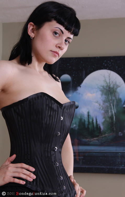 Yummy, Yummy corsets! I can’t get enough of them. I received three new corsets in the mail two days ago to which Viorica was very nice to model for me. You can’t really see it from this angle, but she rocked the famed ‘hourglass’