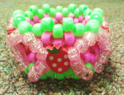 missda1sy:  sbij:  Strawberry Shortcake cuff (Sorry about the poor quality)  SO CUTE 