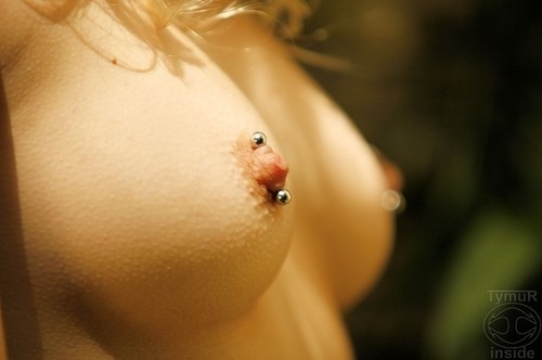 Lesbian nipple piercing