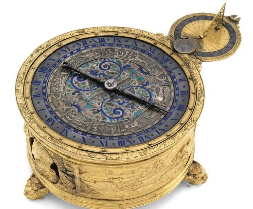 A Gilt-Brass Circular Horizantal Table Clock Case, German, Circa 1580 with Replica MovementSotheby