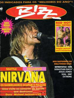 nirvananews:  “Bizz” magazine (March, 1992) cover featuring Kurt Cobain performing live in Seattle on Halloween in 1991. [x] 
