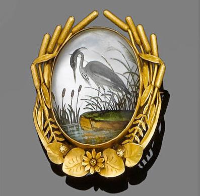 A rock crystal reverse intaglio brooch/pendant, circa 1890 The oval cabochon rock crystal carved and
