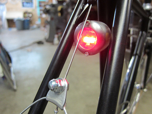 cyclivist: Oh lordy, custom-made taillight. I wonder if they’re taking orders… via Hufnagel Cycles.