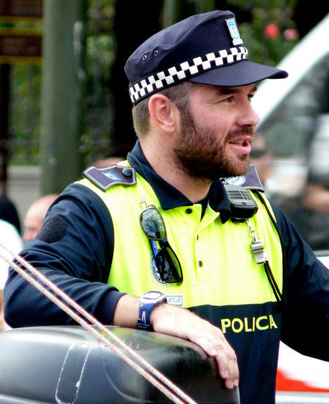 seahorsebear:  He looks like he’d be happier helping an elder across the street than busting crooks.  
