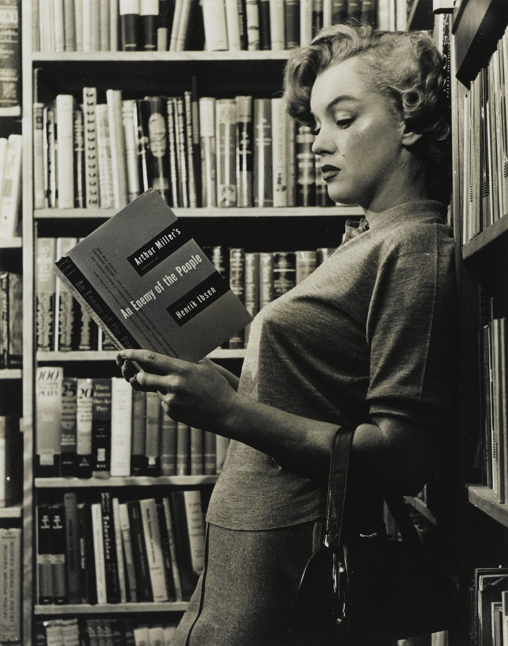 bookstorecouture:  Marilyn Monroe by Ben Ross, 1951 (reading an adaptation by her