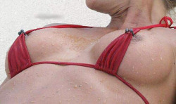 deepperversion:  keeping her bikini in place hormonalchemistry:  great way to limit tanlines 