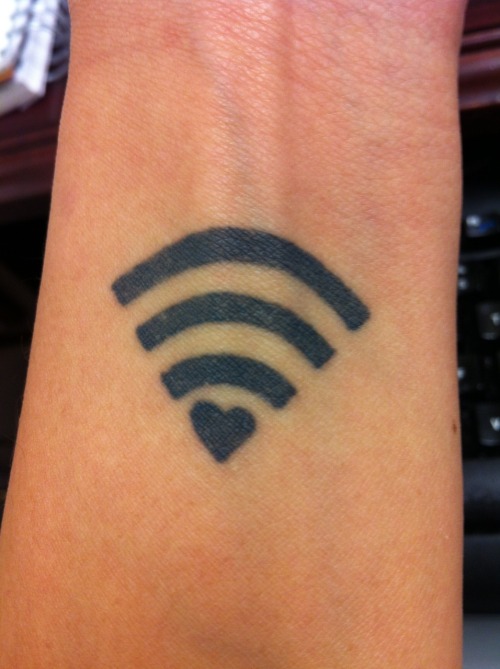 fuckyeahtattoos:  Unfortunately, I didn’t come up with this design - the clever, wonderful folks at BlendApparel did. But when I saw it, I fell absolutely in love. They call it “Lo(ve)-Fi” since it’s a twist on the Wi-Fi symbol on Apple products.