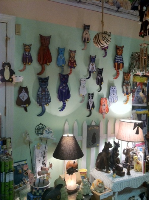 crazy-cat-ladies:  While in Charlottesville, VA, I found a store called The Cat House and so I took pictures! The pics above and below are from the store!     